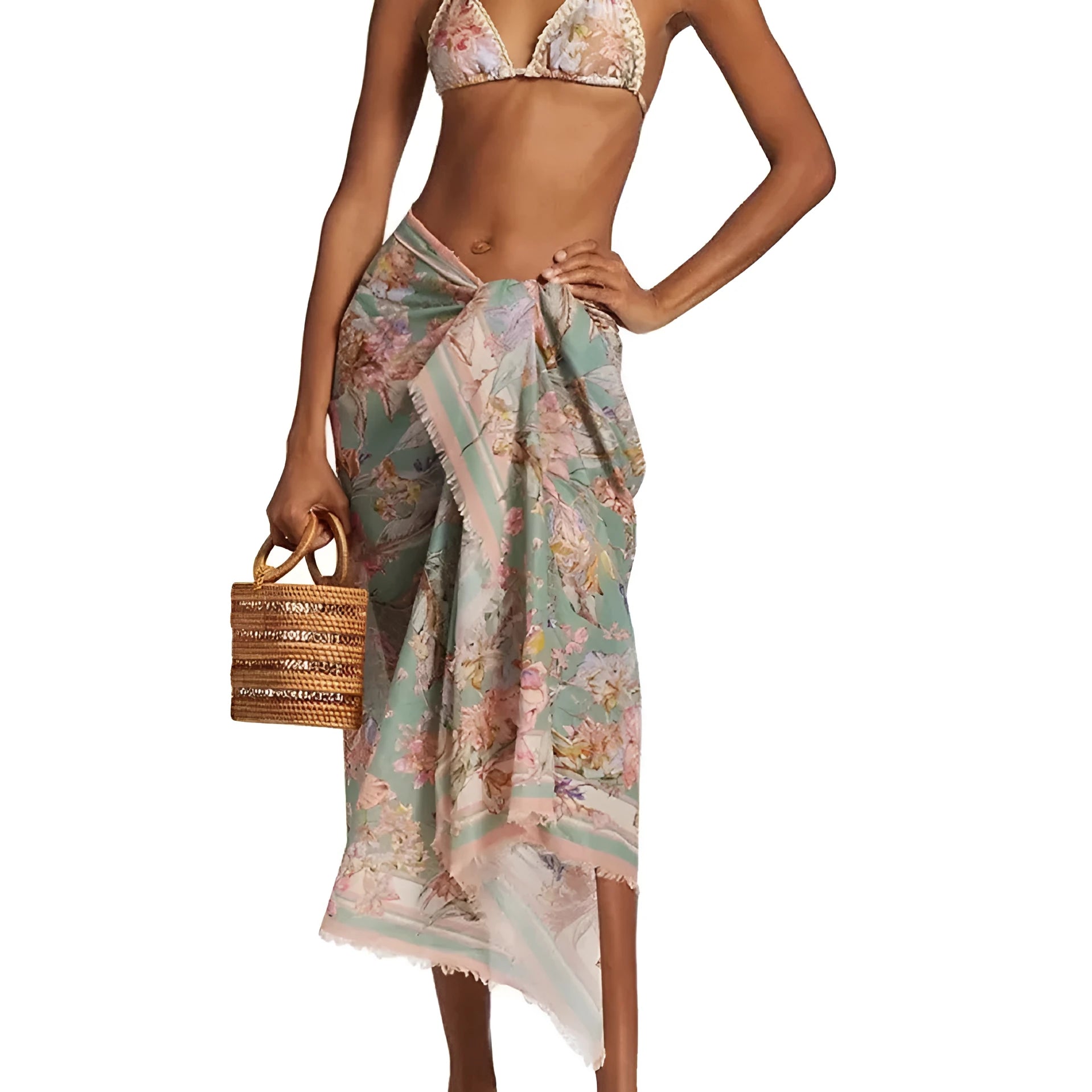 Women's creamy-white floral print bikini set with top, briefs, and skirt laid flat.