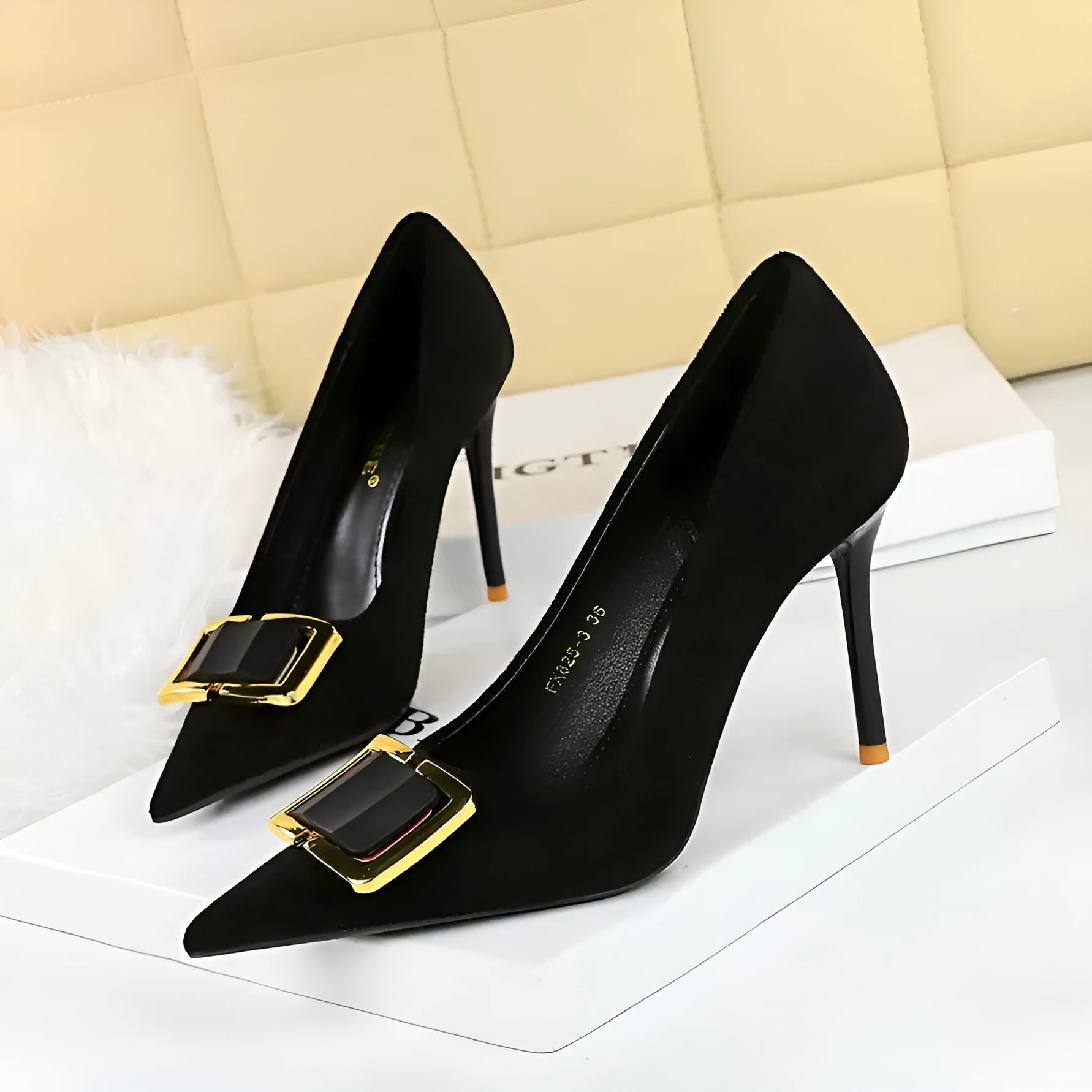 Black suede women's stiletto high heels with a pointed toe and a 9CM high heel on a rubber sole.