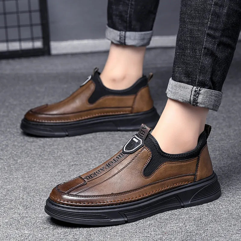 Men's solid colour casual leather shoes with round toe design in black or brown option