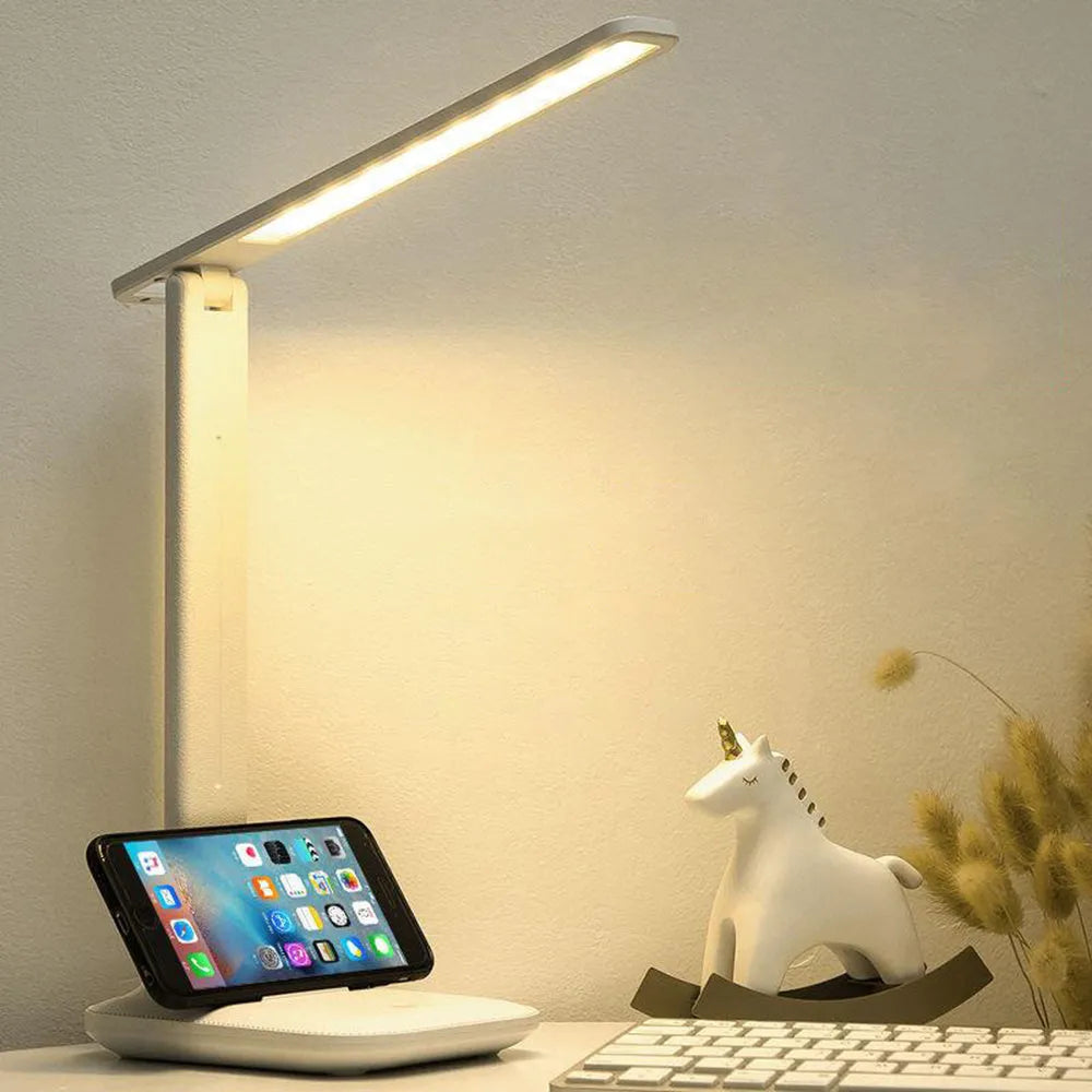 White plastic LED table lamp with touch dimming control and USB charging for children's bedroom use