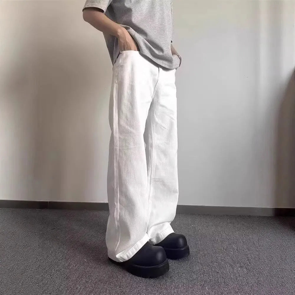 White straight-leg men's jeans with mid waist and zipper fly on mannequin