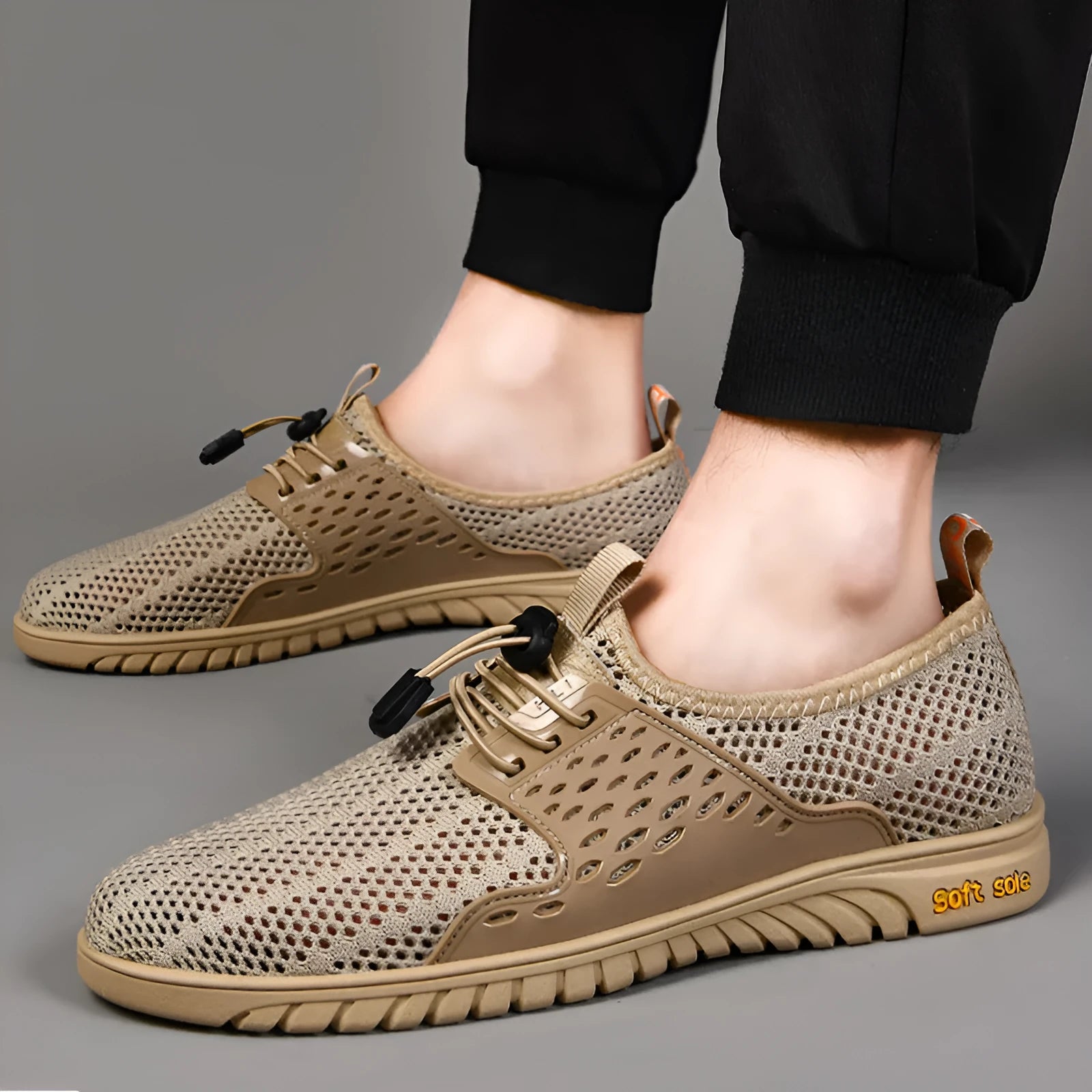Men's mesh casual shoes in black colour with elastic band slip-on design