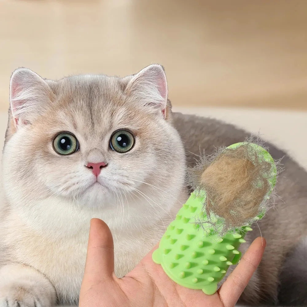 Silicone wall-mounted cat grooming brush with comb teeth and adjustable strap for table legs.