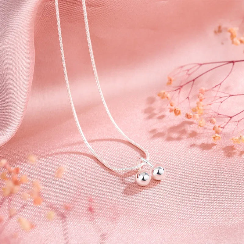 Silver cherry necklace with adjustable snake chain and fruit-shaped pendant