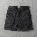 Men's cotton cargo shorts in Army Green colour with multiple pockets and straight leg design