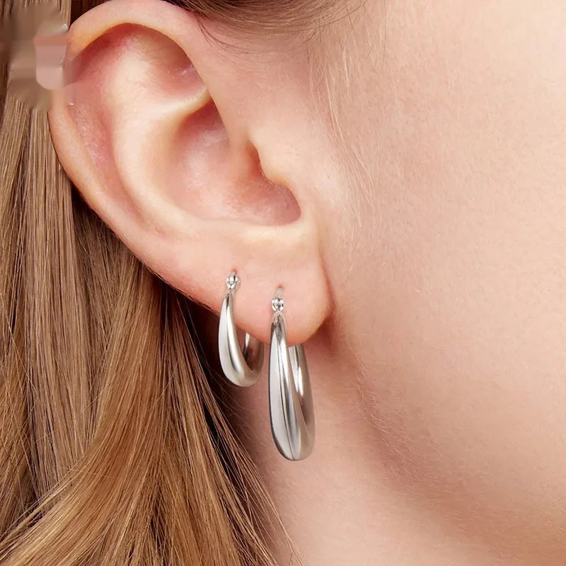 Copper alloy geometric ring ear clip earrings with silver needle closure in three size options