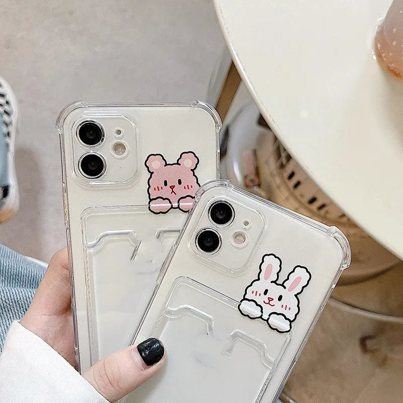 Transparent cartoon printed phone case with card slots for Apple iPhone.
