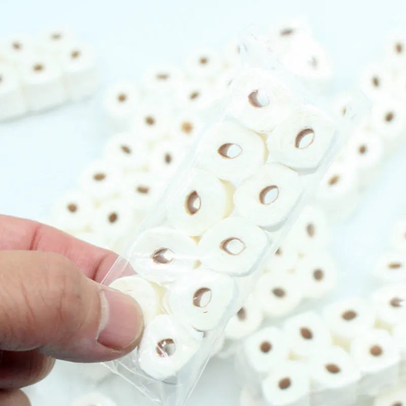 Small paper replica of a toilet paper roll toy for children, measuring 30mm by 15mm by 80mm.