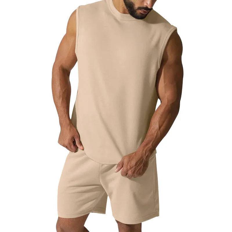 Men's sleeveless sports suit set in cotton blend fabric showing sleeveless top and matching shorts