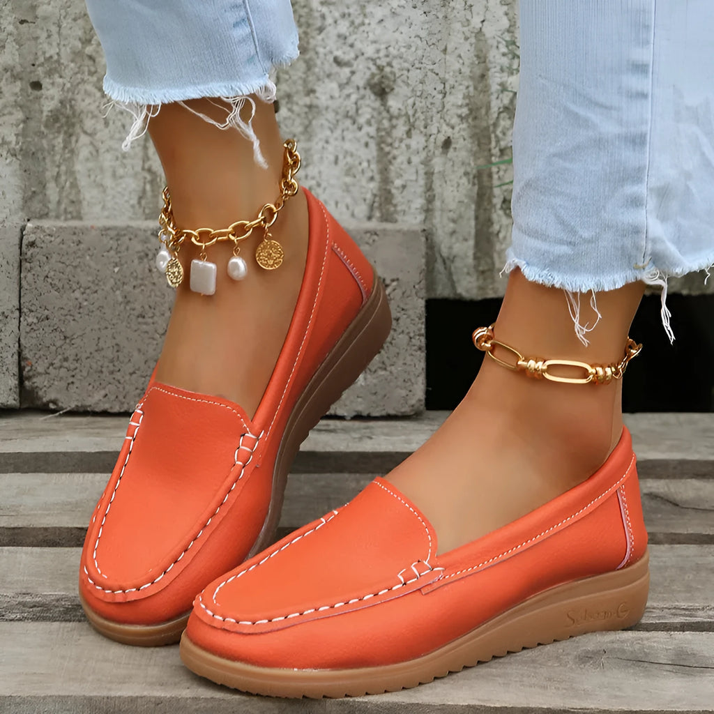 Women's flat loafer shoes in PU leather, shown in multiple colours with round toe and rubber sole.