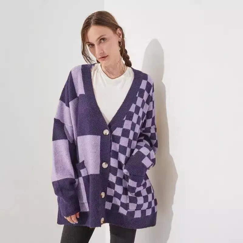 Woman wearing a loose slim fit cardigan with a printed checks pattern in a colour selection.