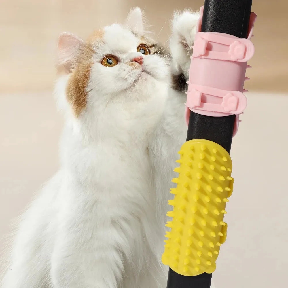 Silicone wall-mounted cat grooming brush with comb teeth and adjustable strap for table legs.