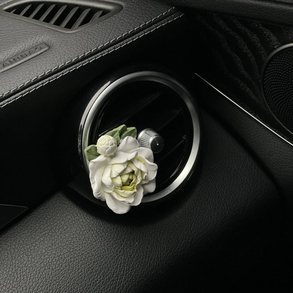 Solid jasmine car air freshener with gypsum construction for vehicle vents