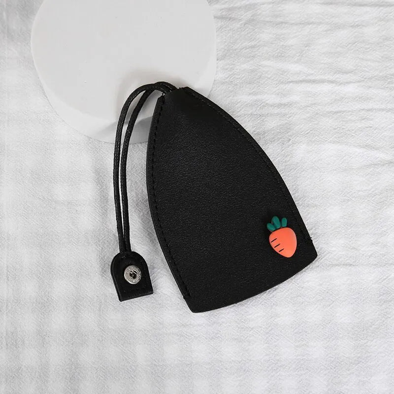Colourful cartoon pull-out key case made from PU leather, showing the key extended from its protective sleeve.