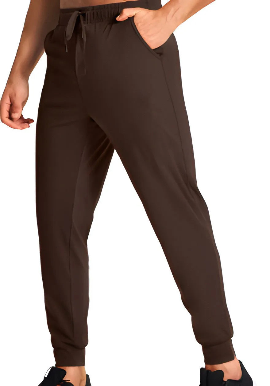 Men's loose-fit casual work trousers in solid colour on hanger, showing relaxed leg cut