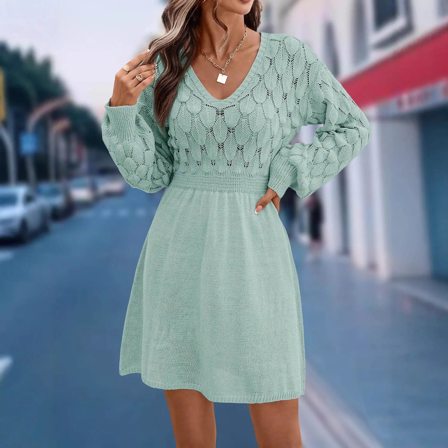 Artistic retro V-neck long sleeve beach dress with high waist and 3D pattern in apricot colour.
