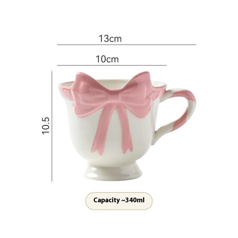 Ceramic mug with heart bow design in black pink or white powder, 301-400ml capacity