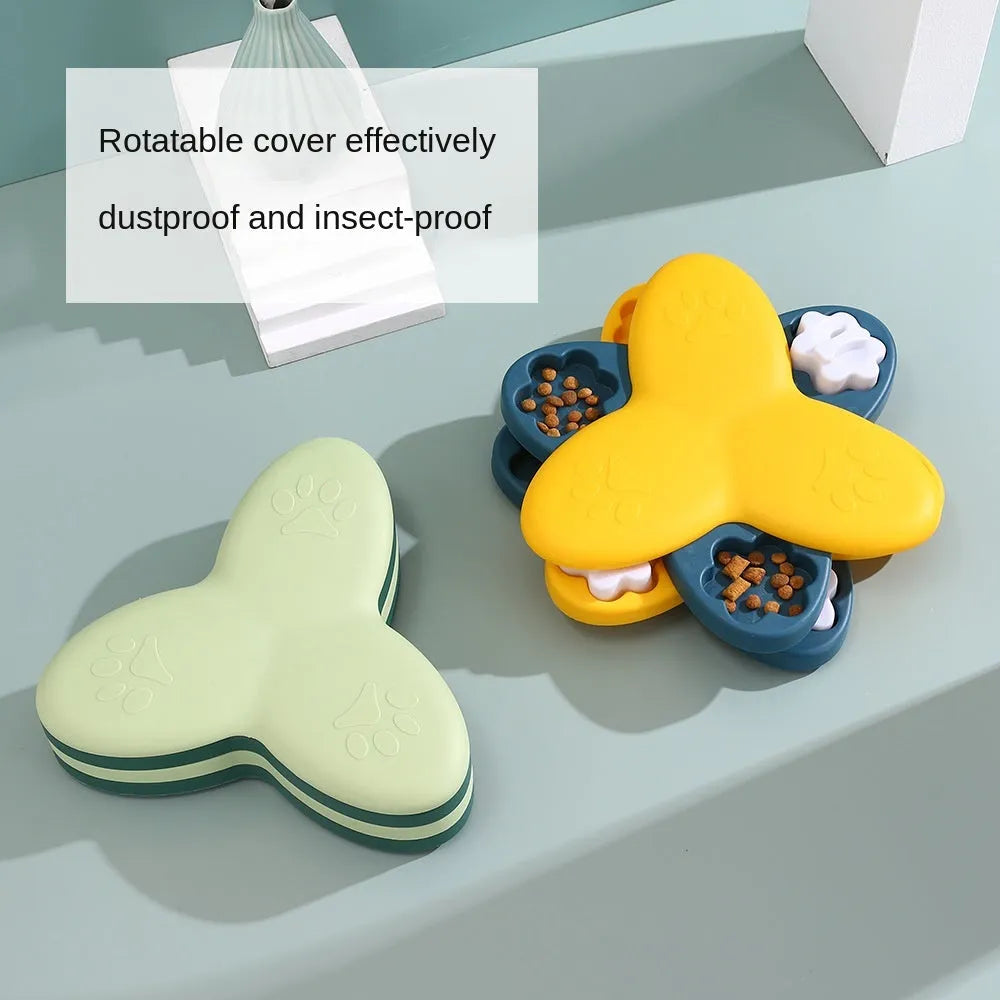 Green and yellow interactive dog puzzle toy with rotatable compartments and bone-shaped covers