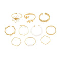 Openwork floral pattern ring set in glossy gold colour with alloy construction