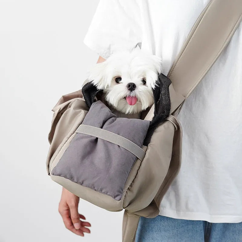 Apricot coloured cloth pet handbag with breathable mesh, shown with dimensions 41cm by 16cm by 28cm