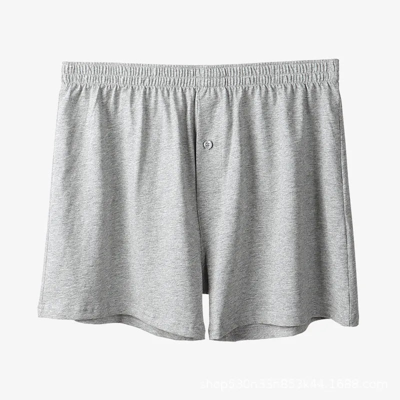 Men's cotton boxer shorts in light grey, dark blue and black colours showing high waist loose fit design