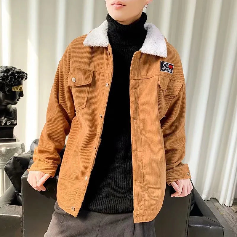 Men's loose fit corduroy workwear jacket in khaki, shown with a stick pocket and regular sleeves.