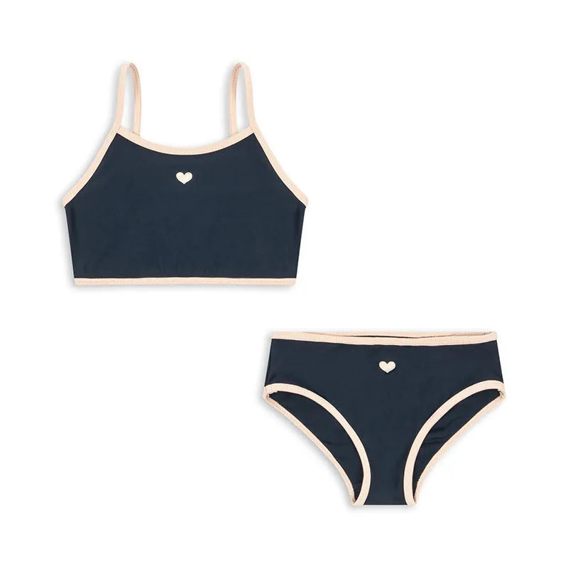 Dark blue girls' split swimsuit briefs made from high elasticity polyester fabric for swimming.