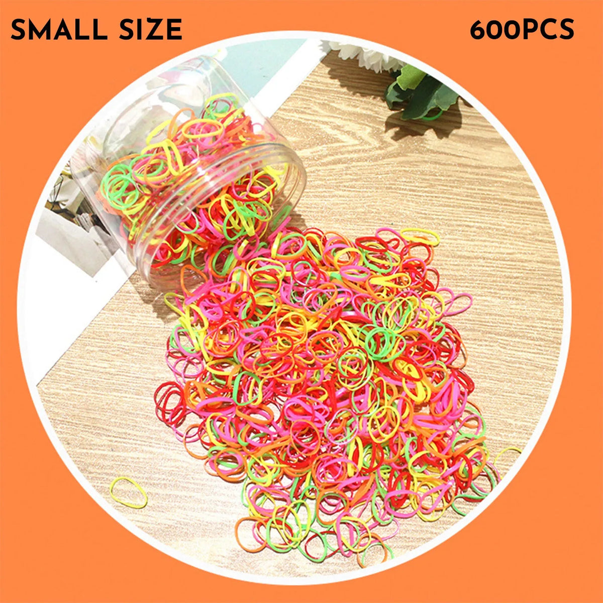 Assortment of colourful small TPU baby hair ties in a reusable plastic container.