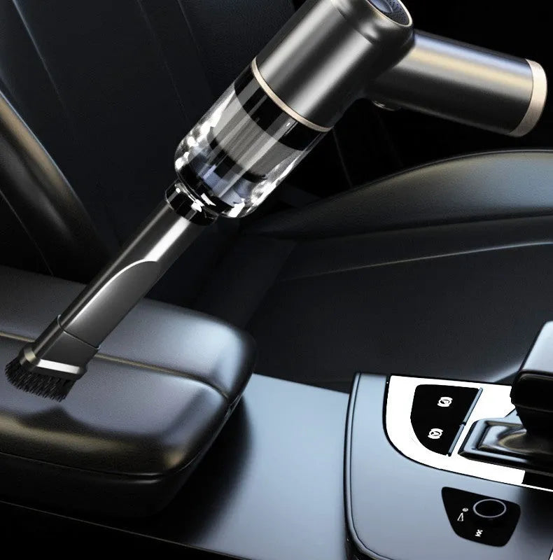 Black wireless handheld car vacuum cleaner with multiple nozzle attachments on a plain background