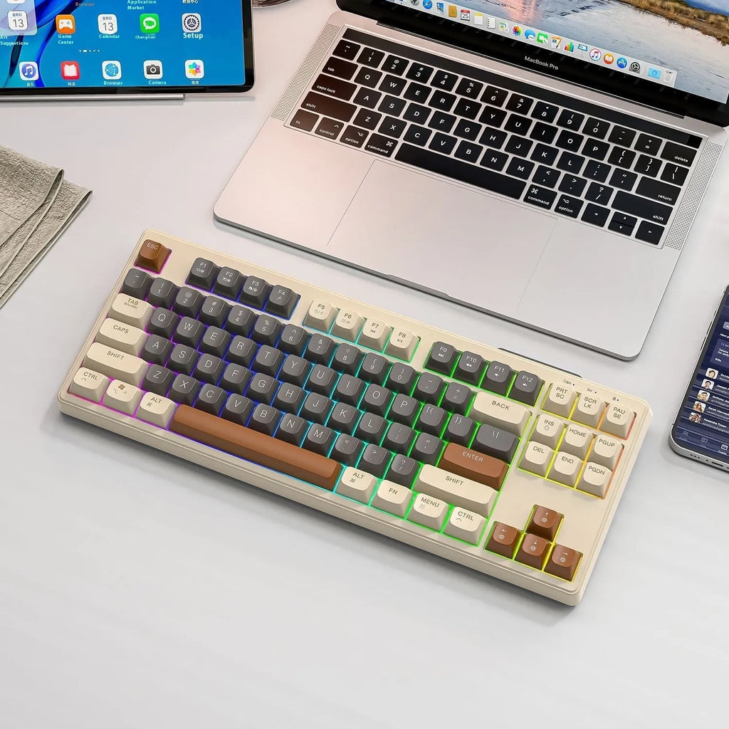 Free Wolf M87 wireless Bluetooth dual-mode keyboard in blueberry colour on a desk