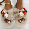 Women's black Christmas hat decoration faux plush slippers with a rubber sole.
