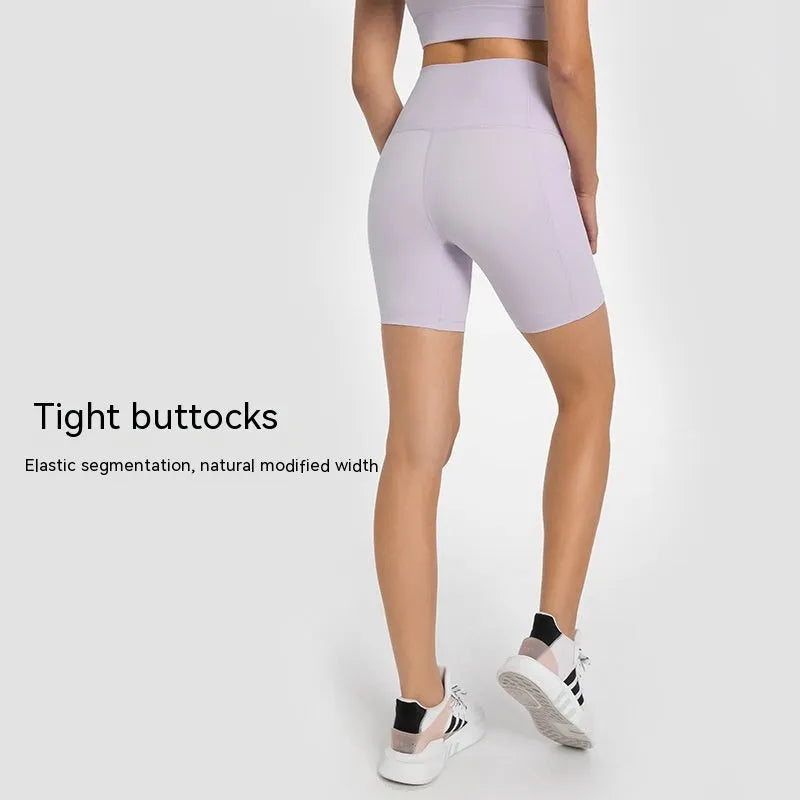 Women's solid colour cotton blend sports shorts with a super stretch waistband.