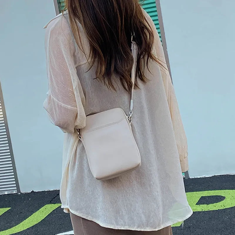 Solid colour PU mobile phone crossbody bag shown in beige, black, green, and khaki.