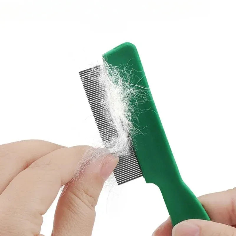 Green plastic-handled flea comb with stainless steel pins for dog and cat grooming.