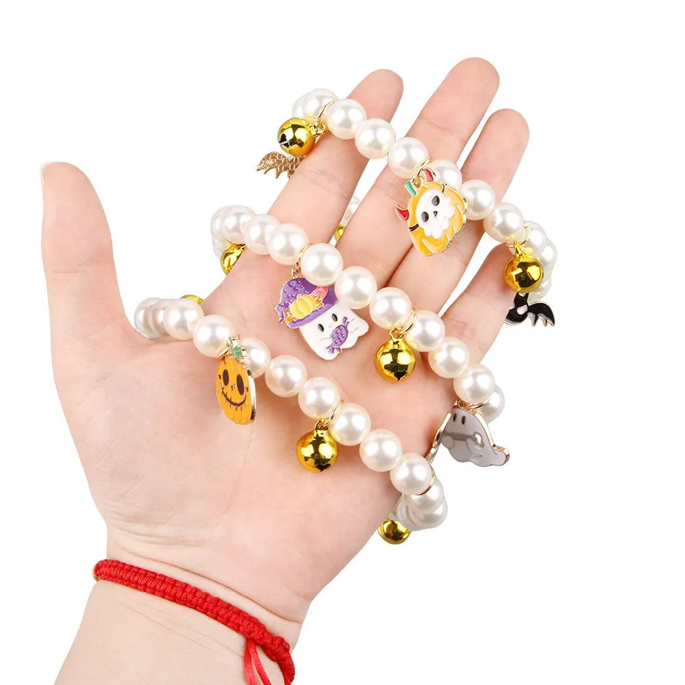 Halloween pet collar with simulated pearl beads and purple ghost pumpkin decoration for cats