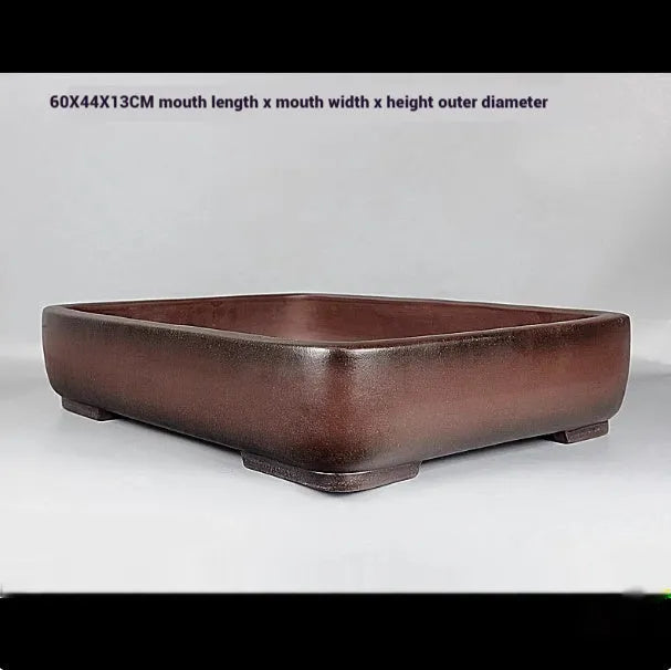 Handmade rectangular antique purple clay flower pot showing its size and textured finish.