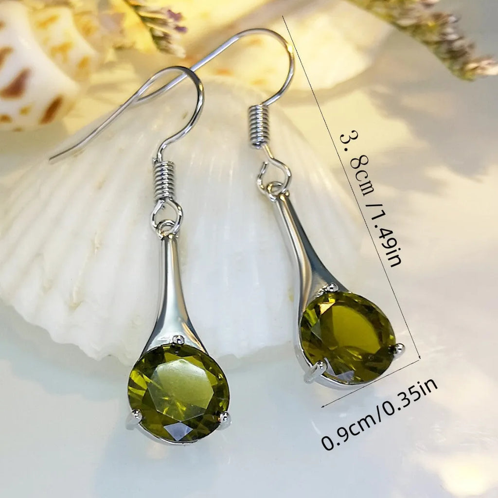 Olive green topaz drop earrings with water shape design and retro style on alloy background