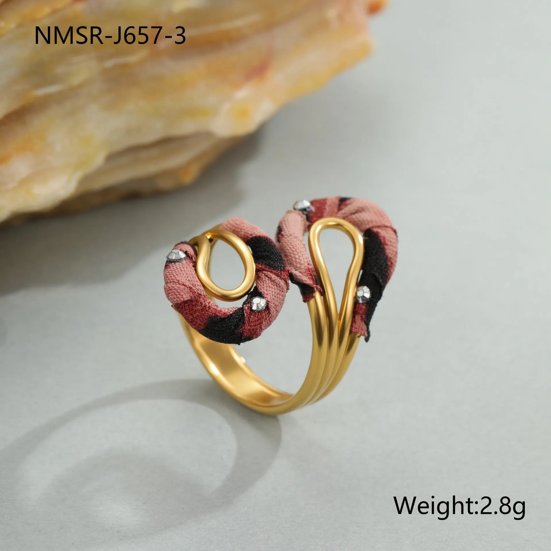 Stainless steel open mouth ring with leopard print and geometric heart or star shape design.