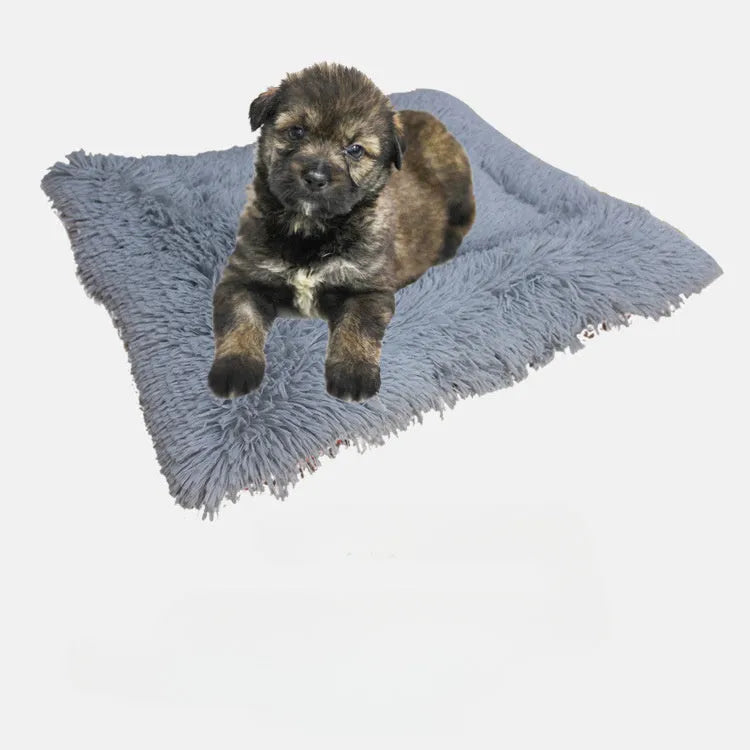 Grey pet plush sleeping pad measuring 61cm by 51cm with a black non-slip bottom.