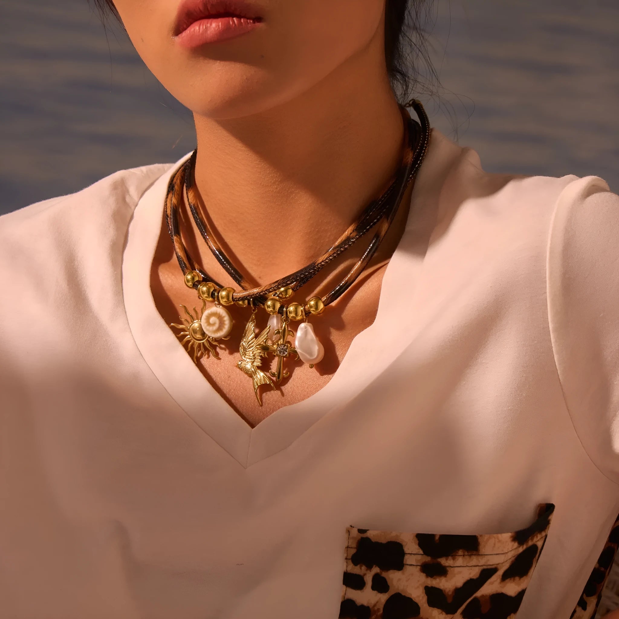 Geometric leopard design stainless steel necklace with 18K gold electroplated finish on adjustable 41-50cm chain