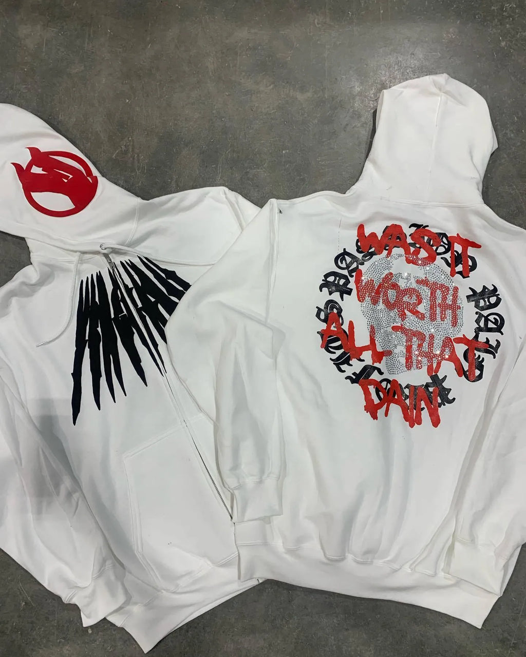 Black hooded sweatshirt with printed skull design and rhinestone decoration in loose cardigan style