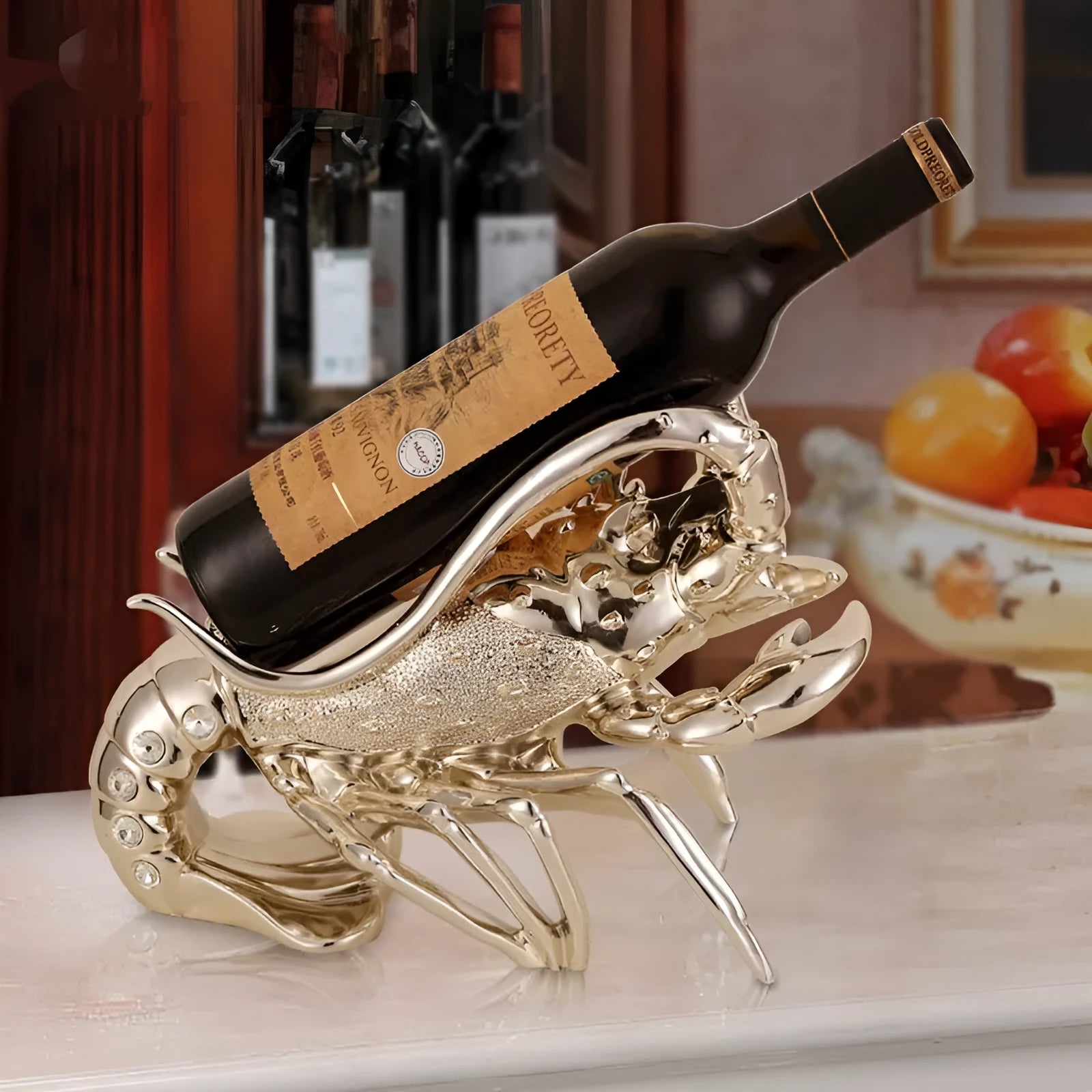 Lobster-shaped wine rack ornament in rose gold or silver, holding a wine bottle.