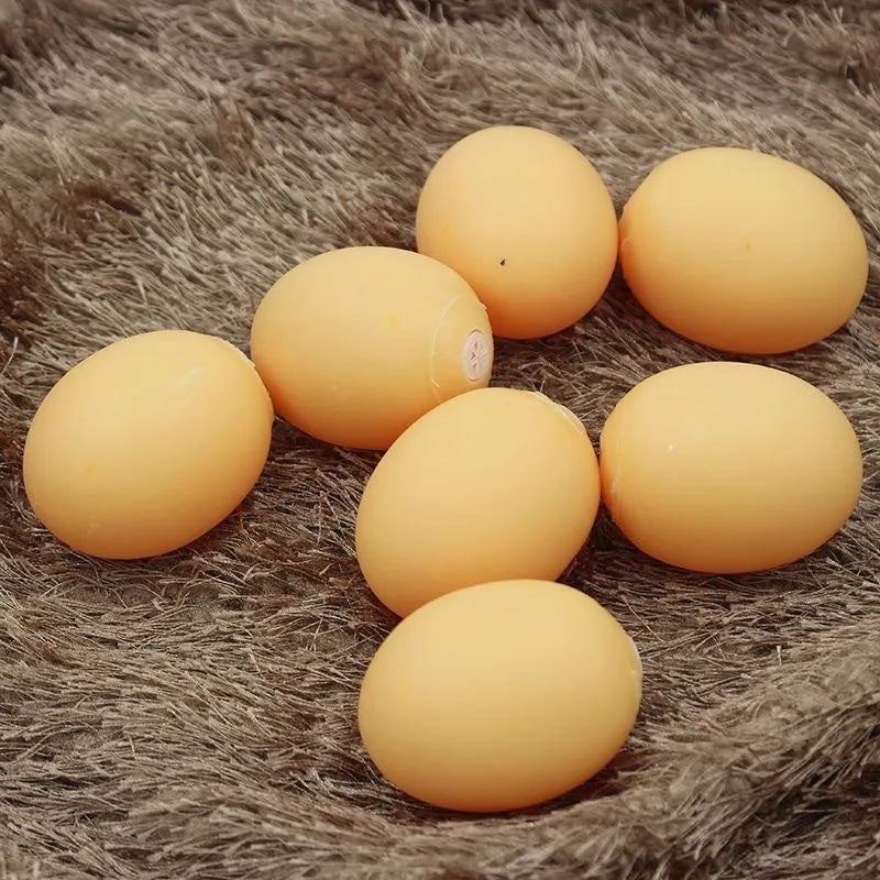 Orange rubber egg-shaped dog chew toy with crinkly sound for small medium breeds