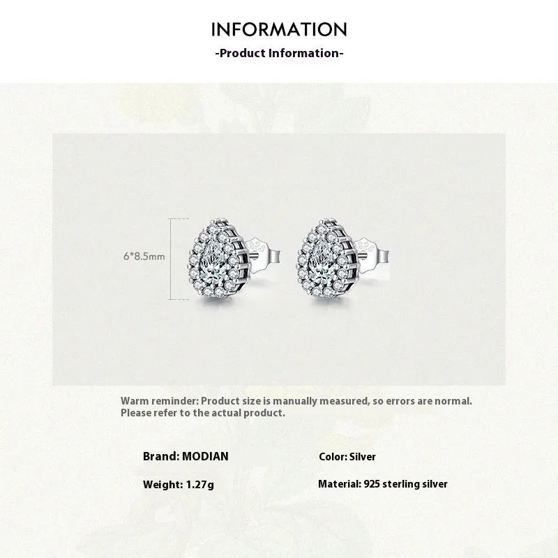 Women's silver water drop stud earrings crafted from 925 sterling silver with diamond treatment