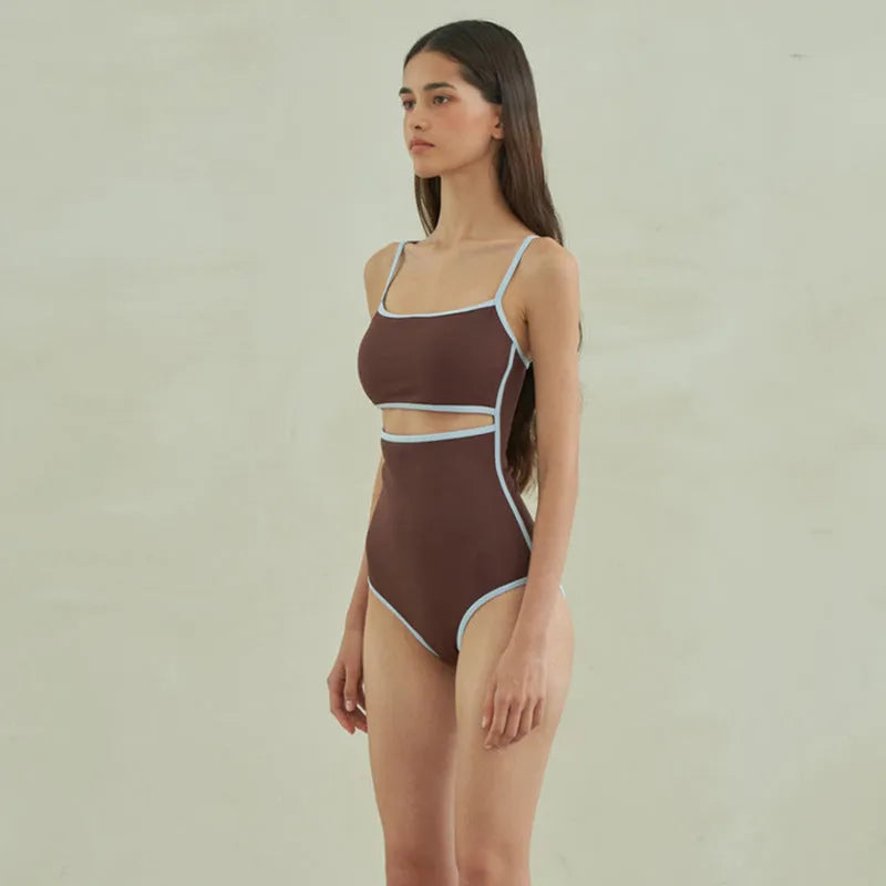 Brown women's triangle top one-piece swimsuit in nylon fabric showing front design