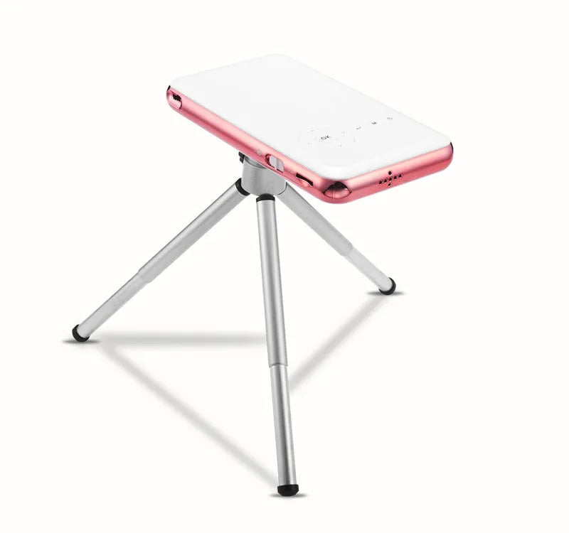 White rose gold miniature DLP Android projector measuring 145x80x17.5mm with 32GB memory