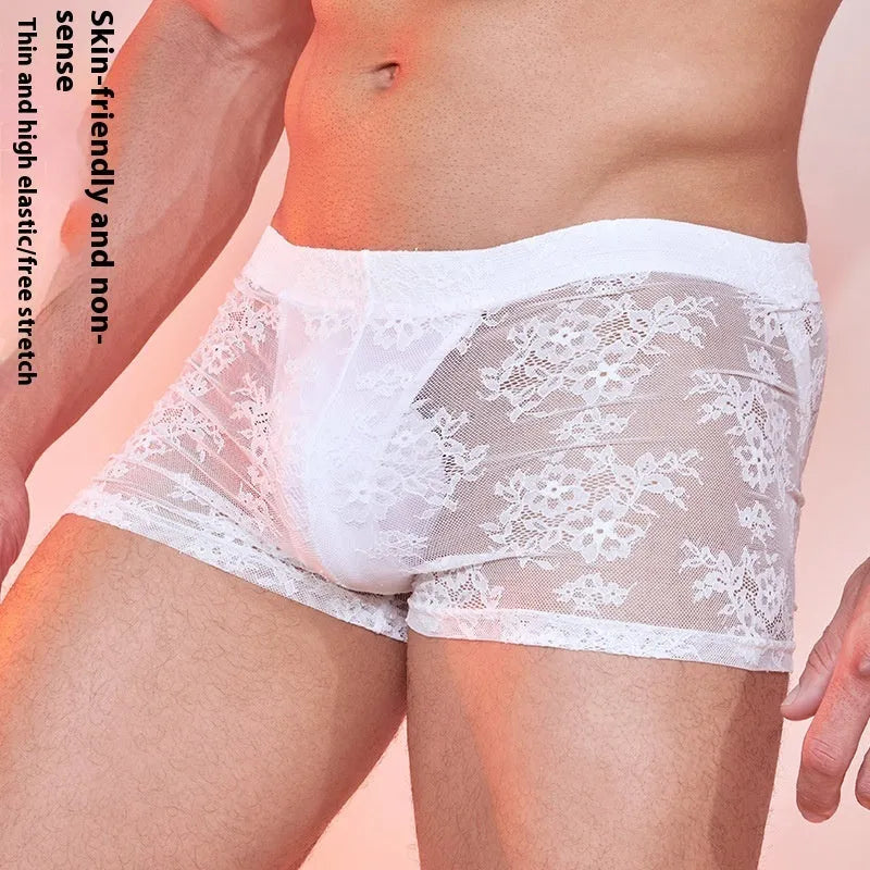 Men's black lace boxer briefs made from nylon fabric, laid flat.
