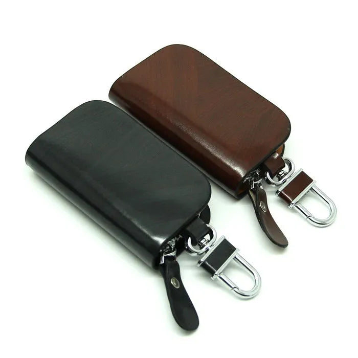 Genuine cowhide leather car key case in black with a frosted finish.