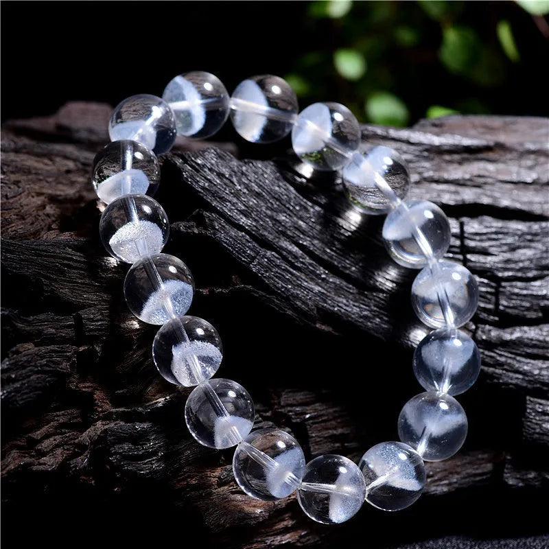 White crystal pyramid bracelet with ghost-like surface and Ruyi design elements showing multiple size options
