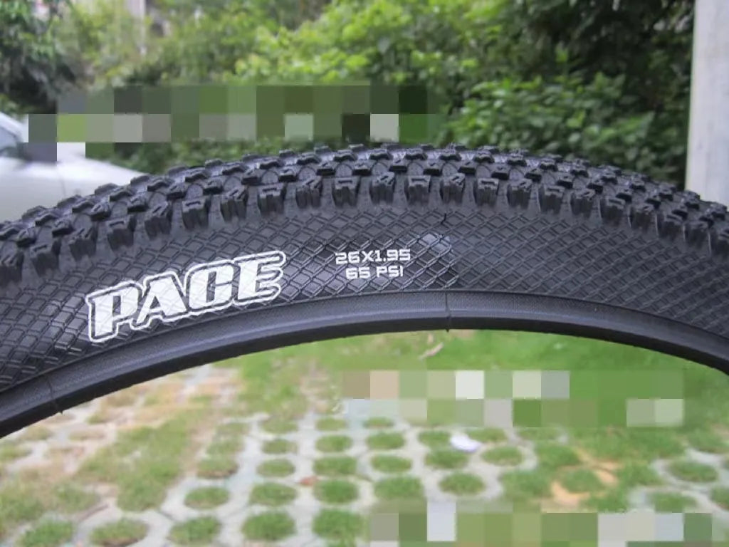 Ultralight mountain bike tyre with reinforced sidewall, shown in a 29x2.1 size with white label.